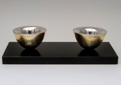 Twin Twister Magnetic salt and pepper pinch pots on black crystal base. copy