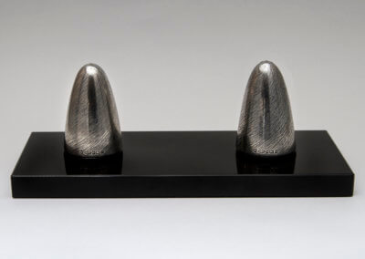 Vortex Textured salt and pepper shakers on black crystal base. copy