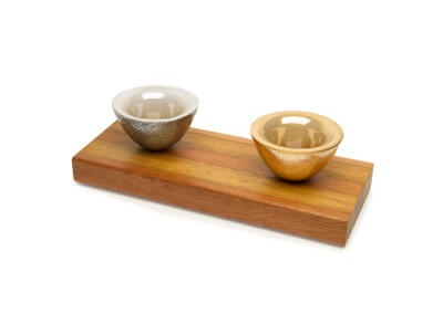 Spiral textured magnetic salt and pepper pinch pots on mixed hardwood base copy